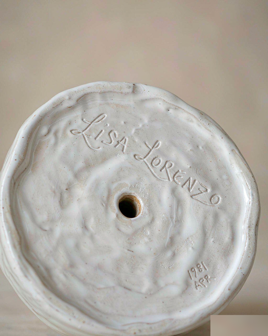 Engraved inscription on a handmade ceramic base